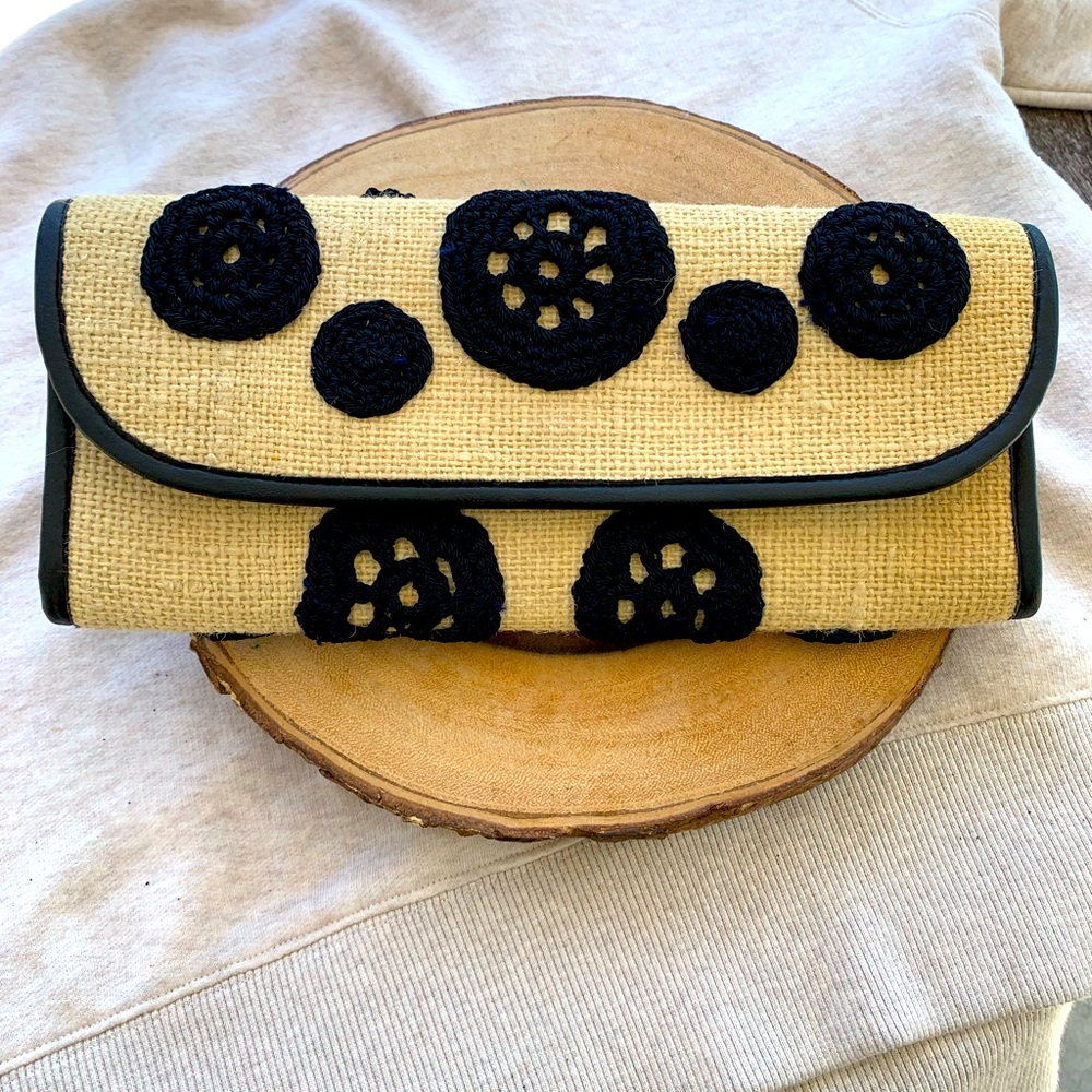 Artmosphere straw knit clutch